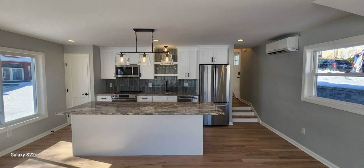 Modern kitchen with island and pendant lights | Connecticut home renovations | Sunwood