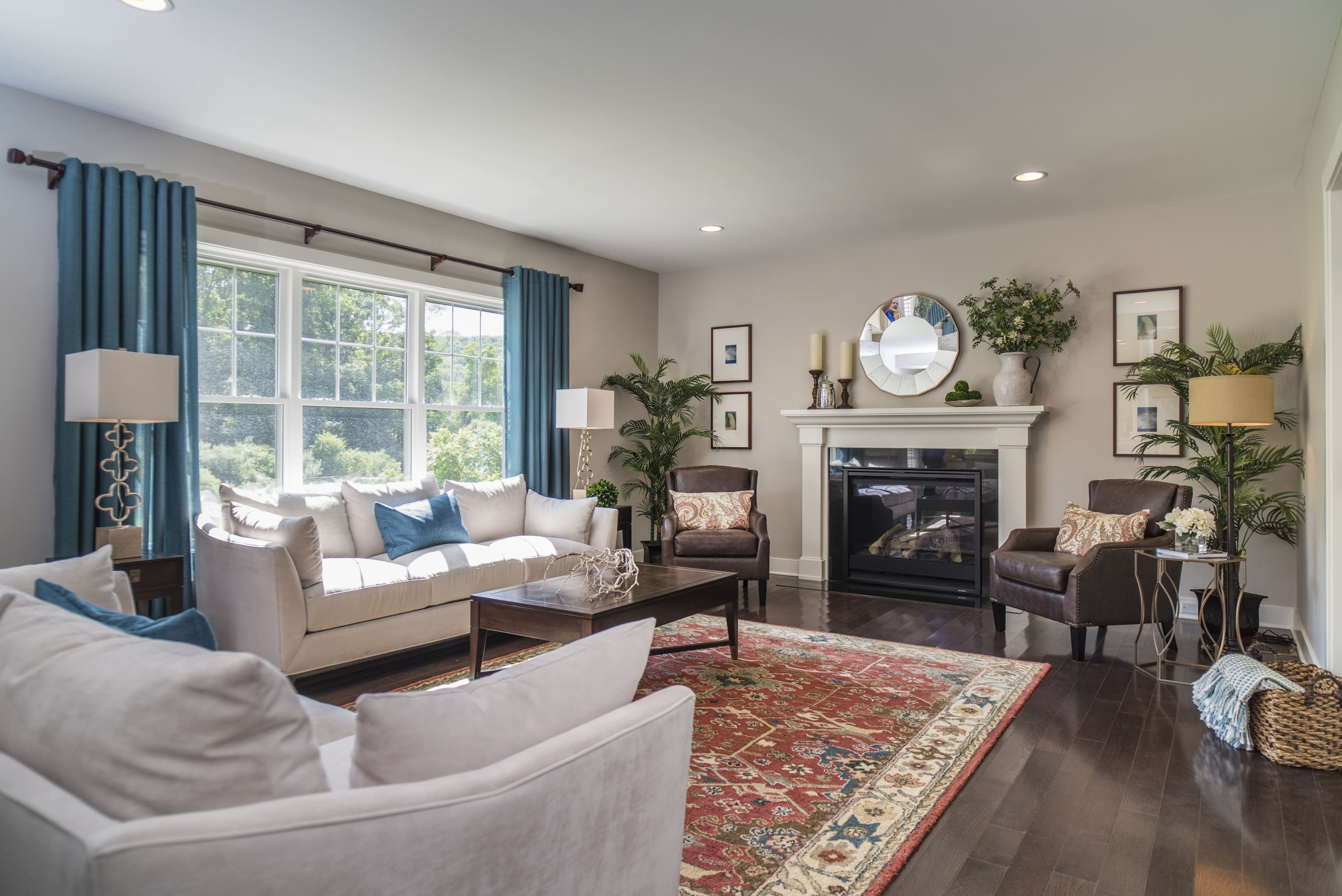 Large Living Room Window Shedding Light Over Full Living Space  | Sunwood Home Builders & Remodelers